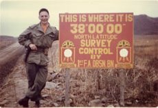 Bill Balaban with 38th Parallel sign in Korea